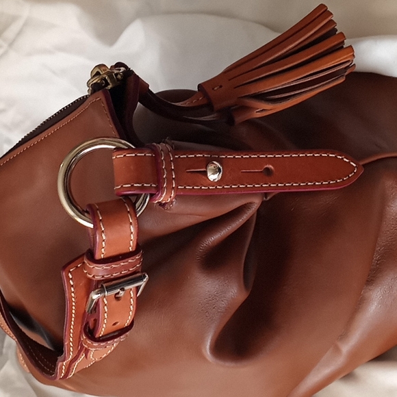 Dooney & Bourke Smooth Genuine Leather    Handbag. Color is a  Rich Caramel. - Picture 12 of 16